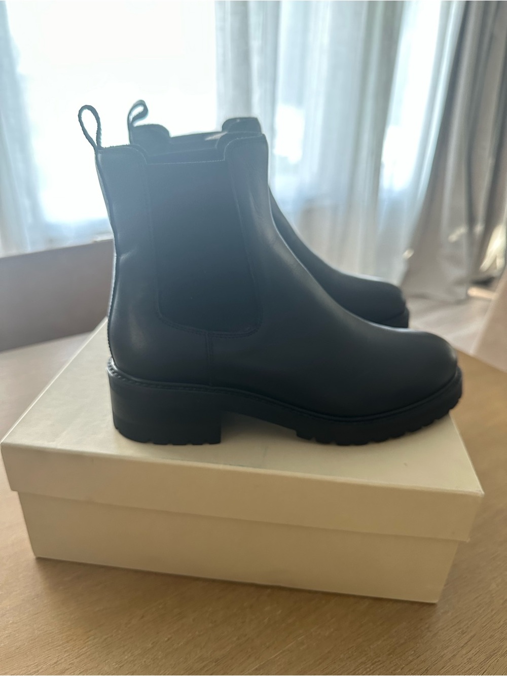 La CANADIENNE Black Leather Chelsea Lug Booties